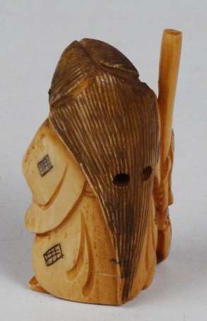 Netsuke Sorciere à deux visages en ivoire Japon H.