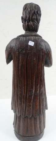 Saint homme portant robe, surplis et étole, 