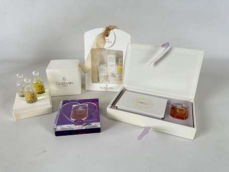 GUERLAIN - Lot de quatre coffrets de miniatures 